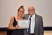 Dr. Nagib Callaos, General Chair, giving Melpomeni Papadopoulou an award certificate in appreciation for his presentation oriented to inter-disciplinary communication entitled: "E-Learning and Experiential Learning - The Case Study of Flipped Classroom in Adults’ Education."